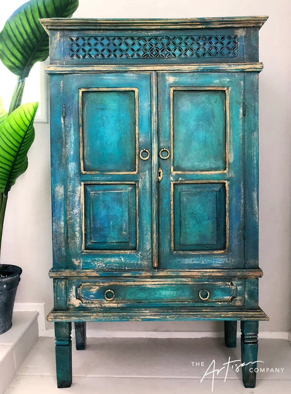 Vintage-style blue cabinet with gold accents on a white background azure kingfisher peacock 
