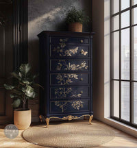 Redesign transfer Large Branch Harmony Dark blue dresser with floral and butterfly designs in a room with large windows and plants.
