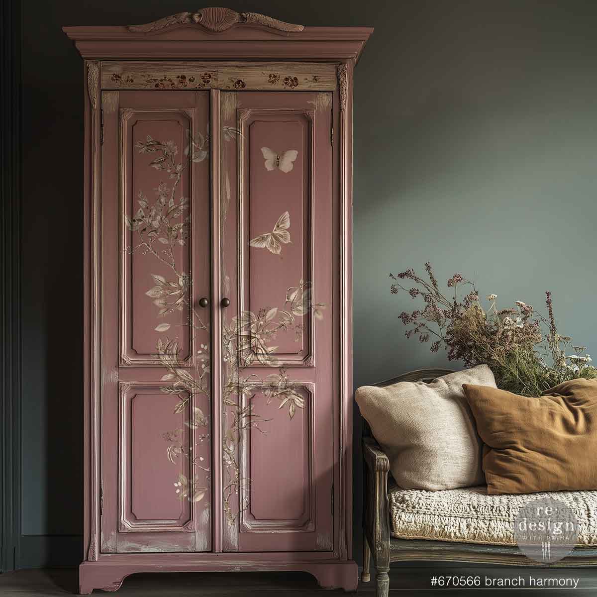 Redesign transfer Large Branch Harmony Pink wardrobe with floral and butterfly designs in a room with a chair and plant.