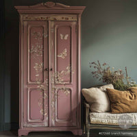 Redesign transfer Large Branch Harmony Pink wardrobe with floral and butterfly designs in a room with a chair and plant.