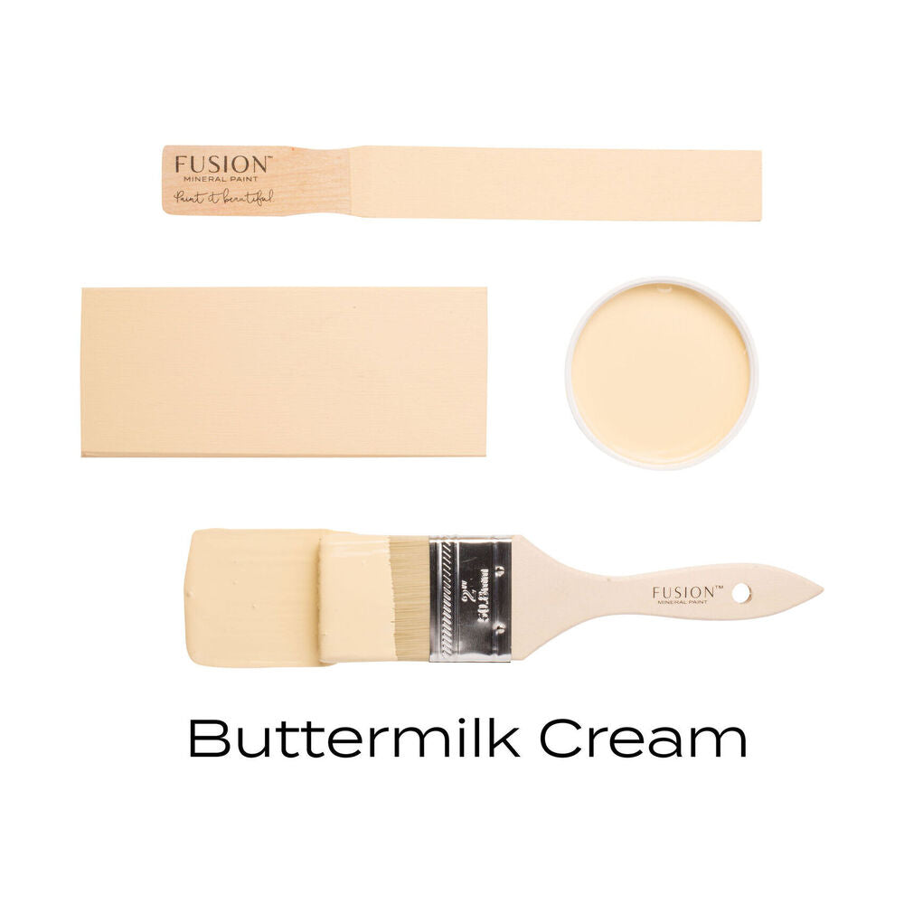 Fusion Buttermilk Cream paint swatch with a brush on a white background