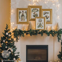 Redesign with Prima transfer middy Heavenly Wings 4 sheet Decorative fireplace mantel with framed artwork, garland, and Christmas tree.
