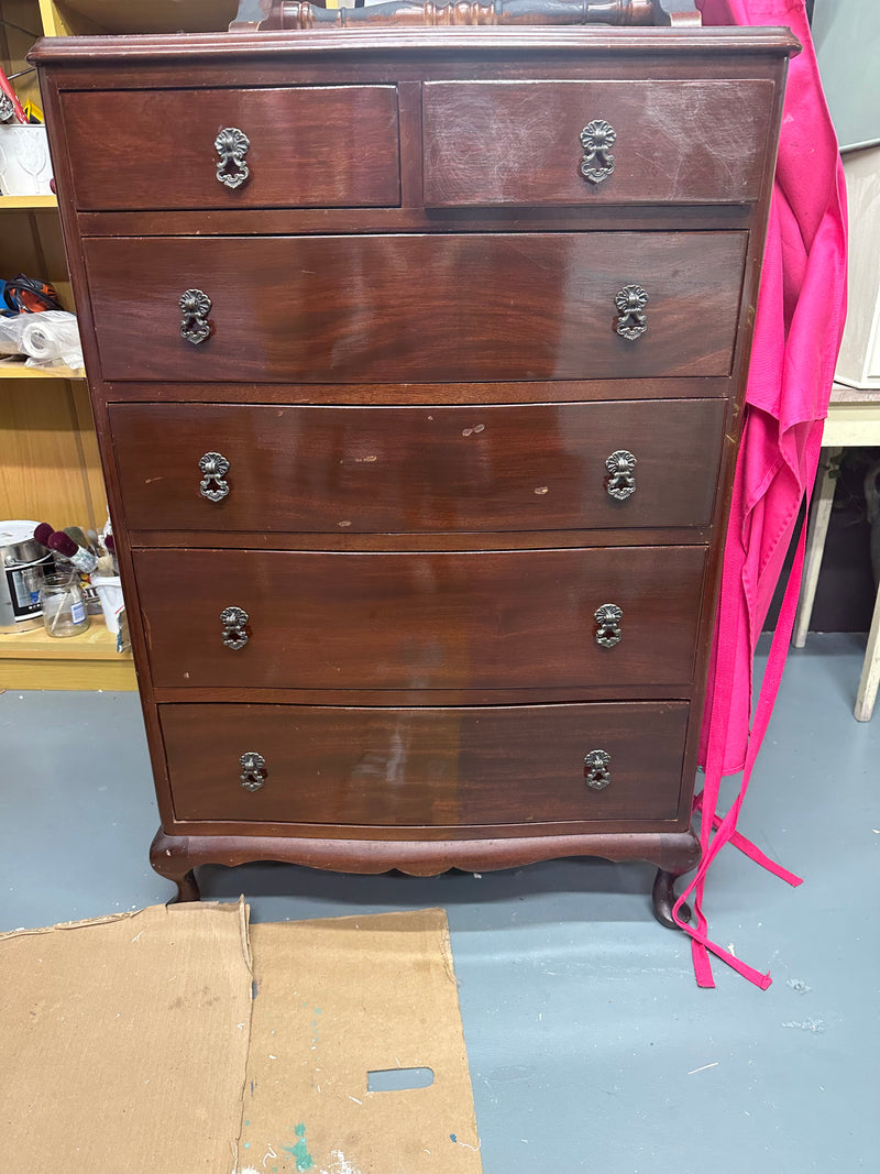This stunning cabriolet legged and slightly bow fronted tallboy needed a special application.  Painted all over in the softest of pink colours Old Chiffon;  it features a timeless IOD transfer and a shimmering metallic finish on the original drawer pulls  We wanted her to be soft and pretty. Collect only from our Tauranga store  Dimensions approx 700mm width x 1080mm height x 460mm depth