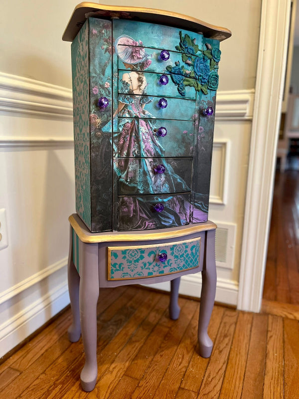 Person in a colorful, elaborate dress standing amidst flowers with a teal background Lacey fantasy decoupage paper