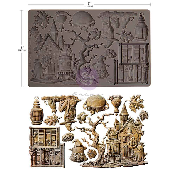 Halloween-themed silicone mold with intricate designs on a white background