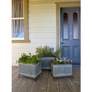 Three galvanized metal rectangular planter boxes,  Footed Planter Zinc Rectangle 