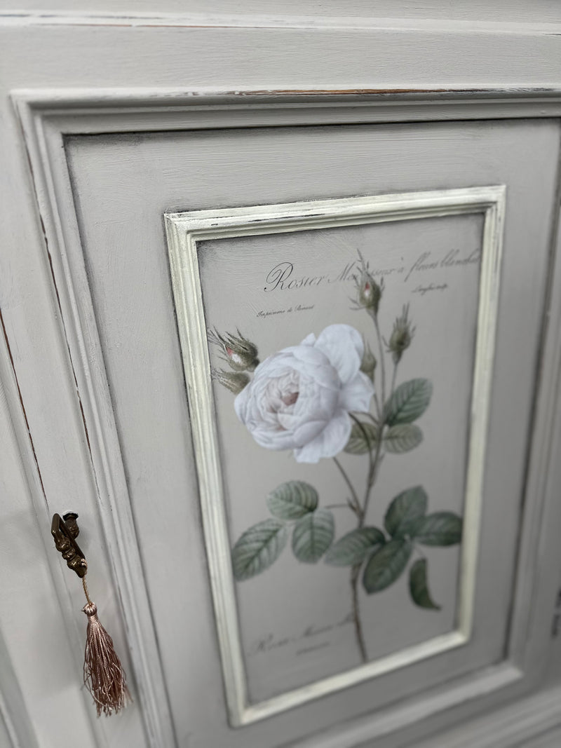 An old piece of furniture given a classic and pretty French Provincial look using florals and premium chalk paint. Has a two tone look with Duck egg on the interior and comes with original key!  Dimensions approx: 2000mm height x 540mm depth